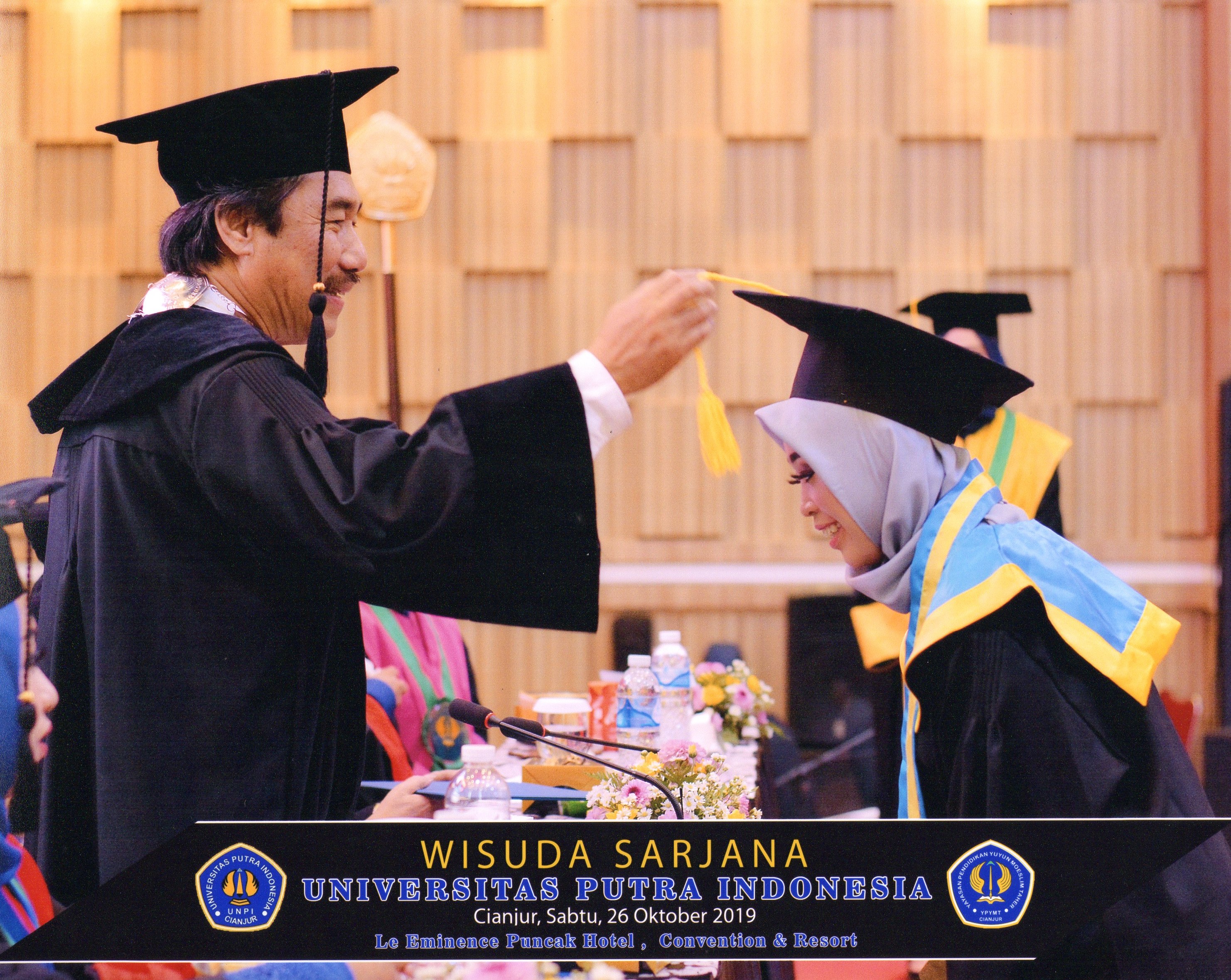 Ita receiving her degree in October 2019